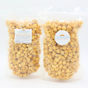 Two 14oz bags of Goodson popcorn on a white background