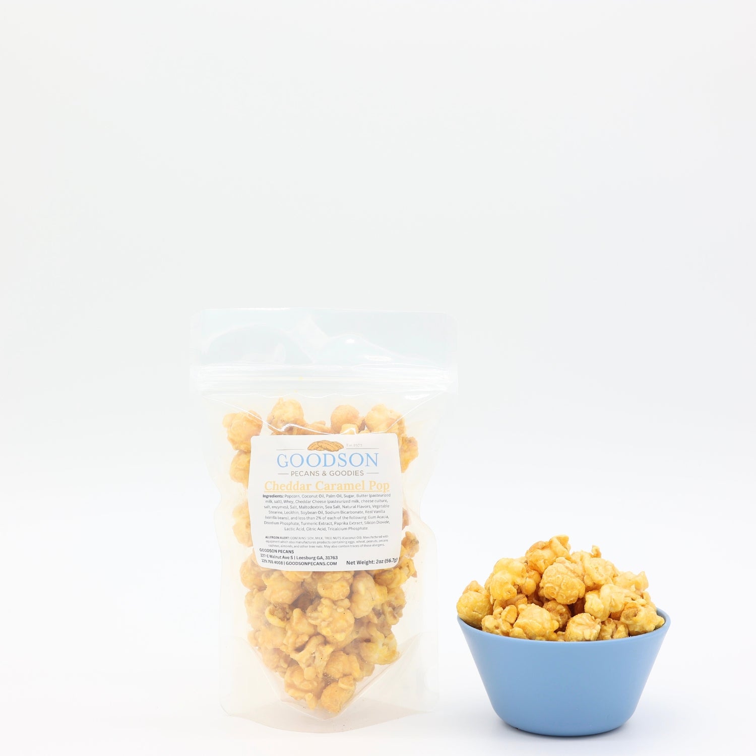 2oz bag and bowl of popcorn with 'Goodson' label on a white background