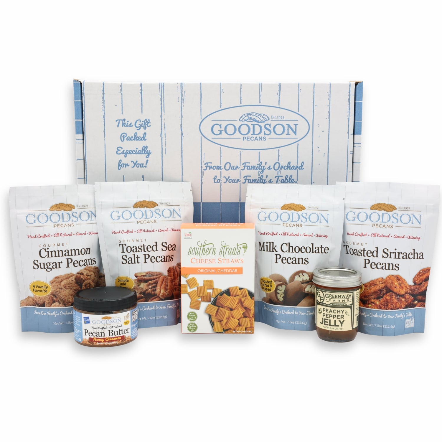 Goodson Pecans gift set with various pecan products, a box of Southern Straws Cheese Straws, a jar of Greenway Farms Peach Pepper Jelly, and a box on a white background.