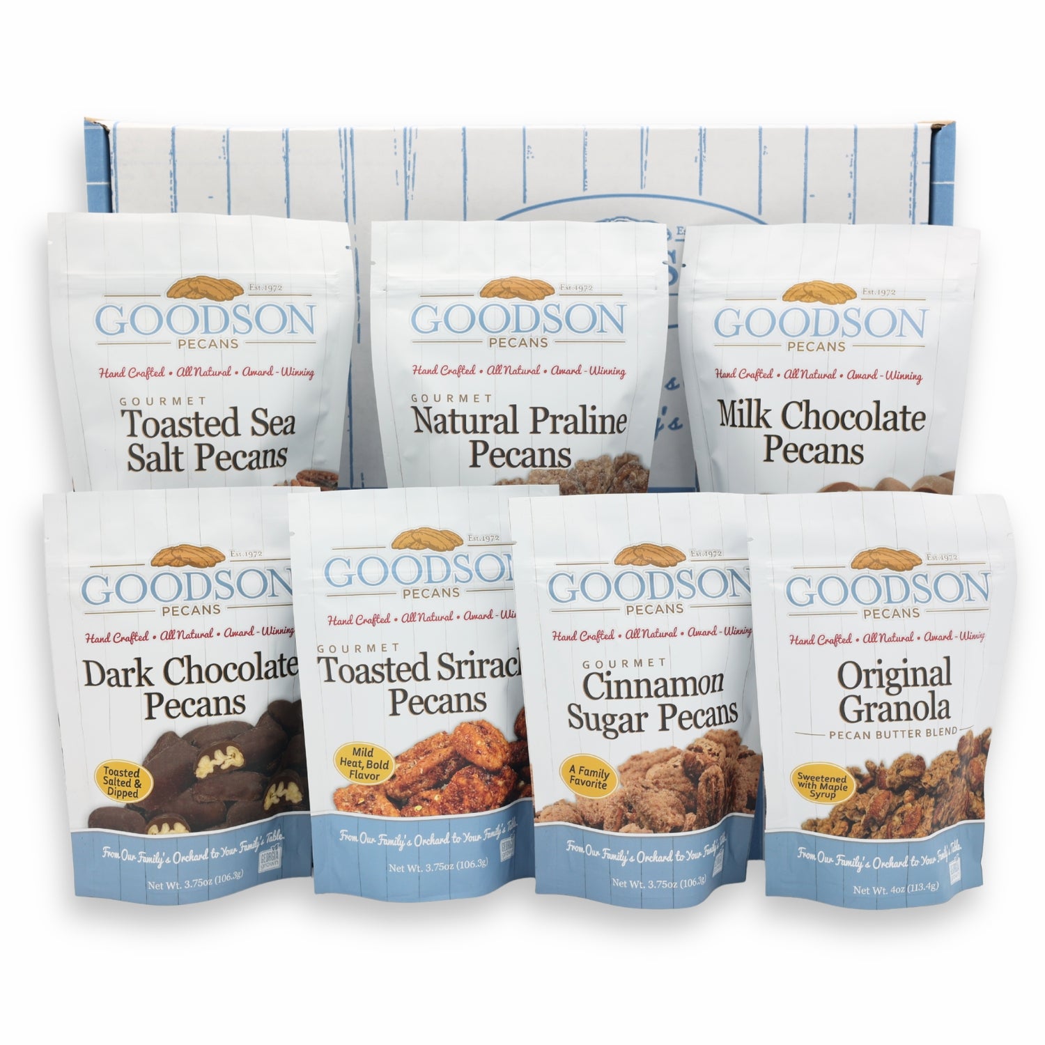 Assorted Goodson Pecans packages on a white background