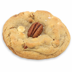 Cookie with a pecan and white chocolate chips on a white background