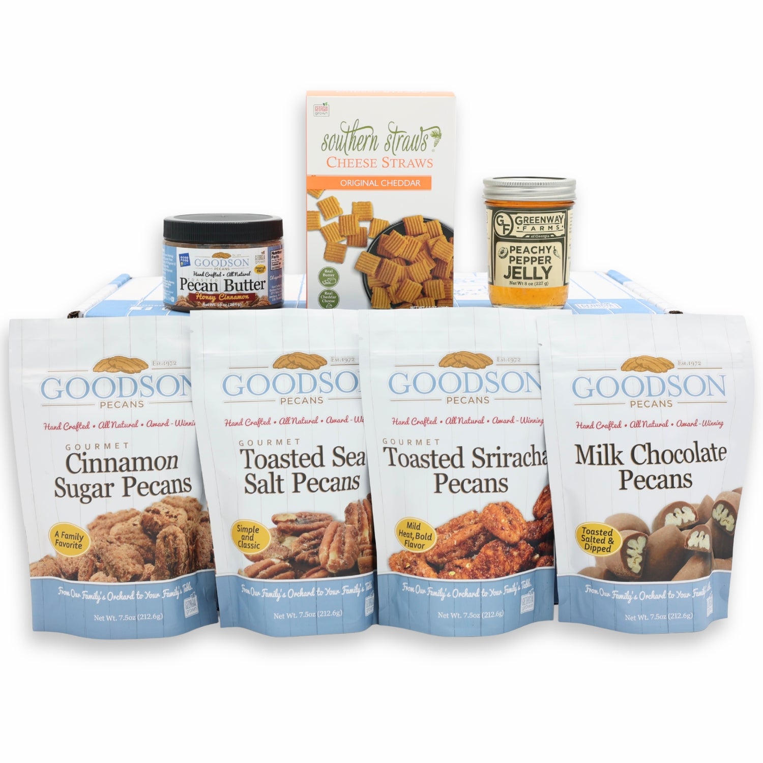 Assorted food products including pecan packages and condiments on a white background