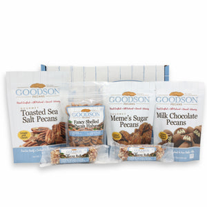 Packages of Goodson Pecans Toasted Sea Salt Pecans Fancy Shelled Pecan Halves, Meme's Sugar Pecans, Milk Chocolate Pecans, two packages of Goodson Pecans' Pecan Rolls, and a Goodson Pecans Box against a white background.
