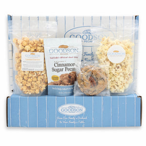 Goodson Pecans snack box with popcorn, cookies, and pecans on a white background