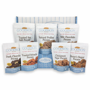 Packages of Goodson Pecans' Toasted Sea Salt Pecans, Natural Praline Pecans, Milk Chocolate Pecans, Dark Chocolate Pecans, Toasted Sriracha Pecans, Cinnamon Sugar Pecans, and Meme's Sugar Pecans with a Goodson Pecans Box against a white background.