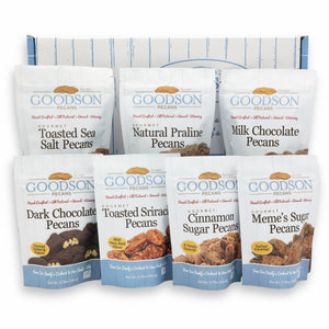 Assorted Goodson Pecans packages on a white background